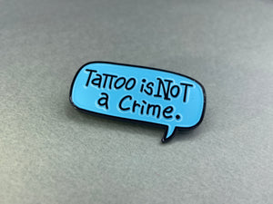 
                  
                    “Tattoo is not a crime” Pin badge
                  
                